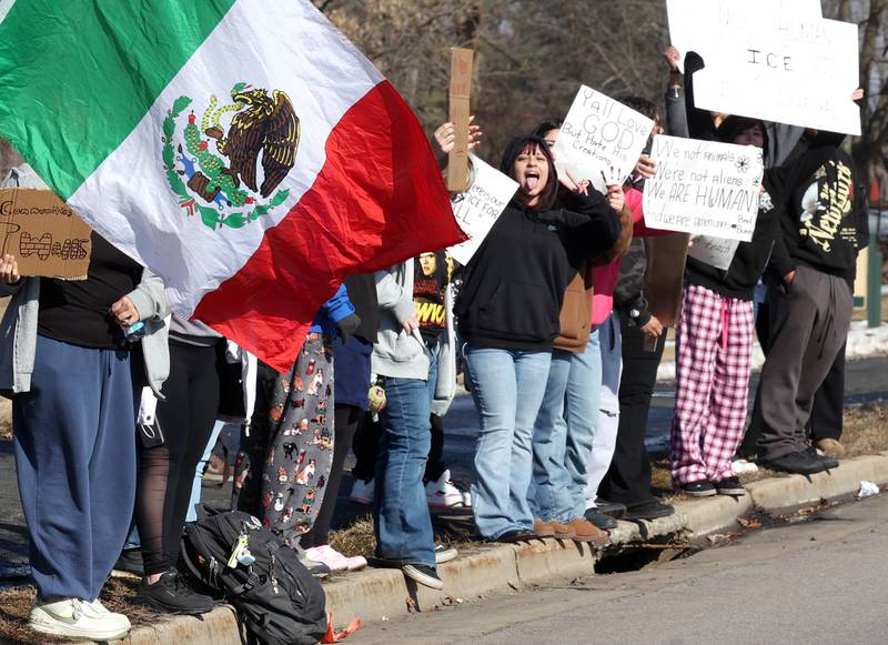 DeKalb High School students gather for a protest Tuesday, Feb. 10, 2026, on Sycamore Road in front of Hopkins Park in DeKalb. The students walked out of school Tuesday to protest against ICE involved violence and arrests.
