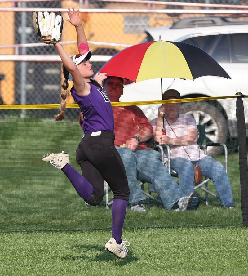Dixon's Bailey Tegeler makes a leaping catch during their game against Sycamore Thursday, May 12, 2022, at Sycamore High School.