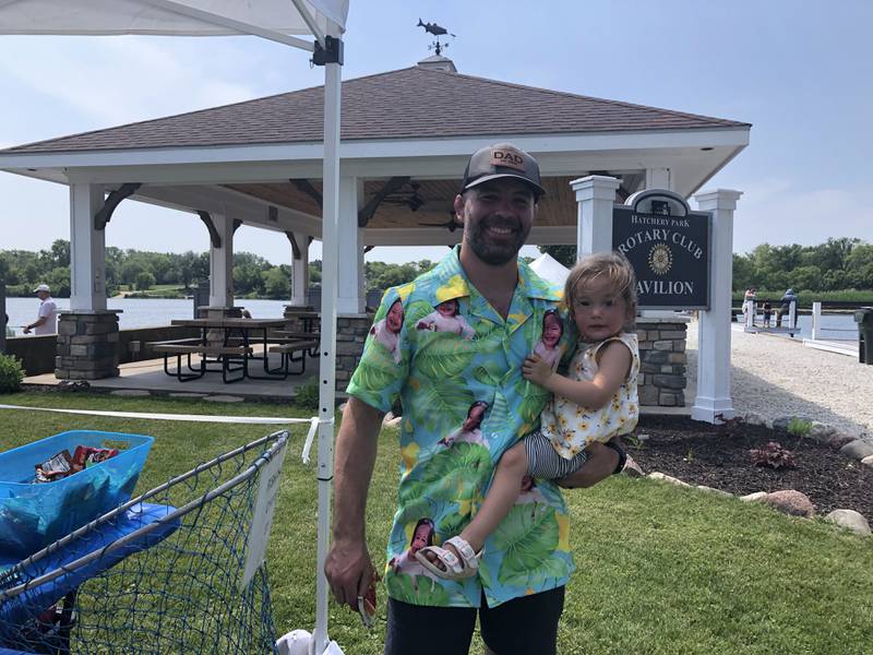Anthony Pace wears a shirt with his daughter Blake Pace's, 2, of Pingree Grove face on it at a Father's Day event June 16, 2024 at Hatchery Park in Spring Grove.