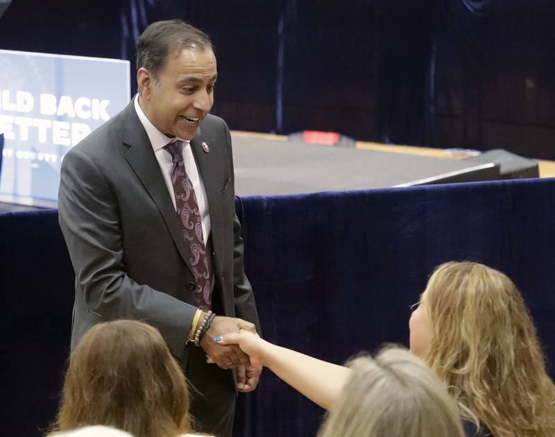 U.S. Rep. Raja Krishnamoorthi, D-Schaumburg, greets people before President Joe Biden speaks at McHenry County College Wednesday, July 7, 2021, in Crystal Lake.