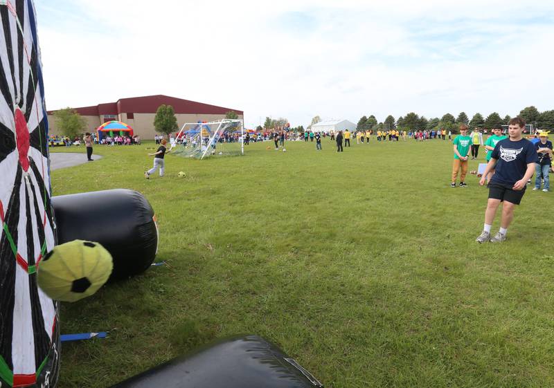 Ethan Meyer of Logan Jr. High School in Princeton, (right) kicks a soccer ball on an inflatable target during the Wallace Warrior Games on Friday, May 8, 2026 at Wallace Grade School. The unified event promoted inclusiveness, friendships and fun. 25 schools and over 400 kids from La Salle, Bureau and Putnam Counties participated in the event.