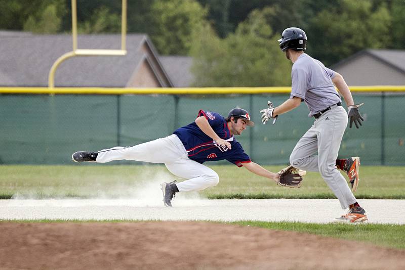 Ryan Pitzer of the Whiteside Wildcats semi-pro team dives for a ball against Palmer Wednesday, July 19, 2023.