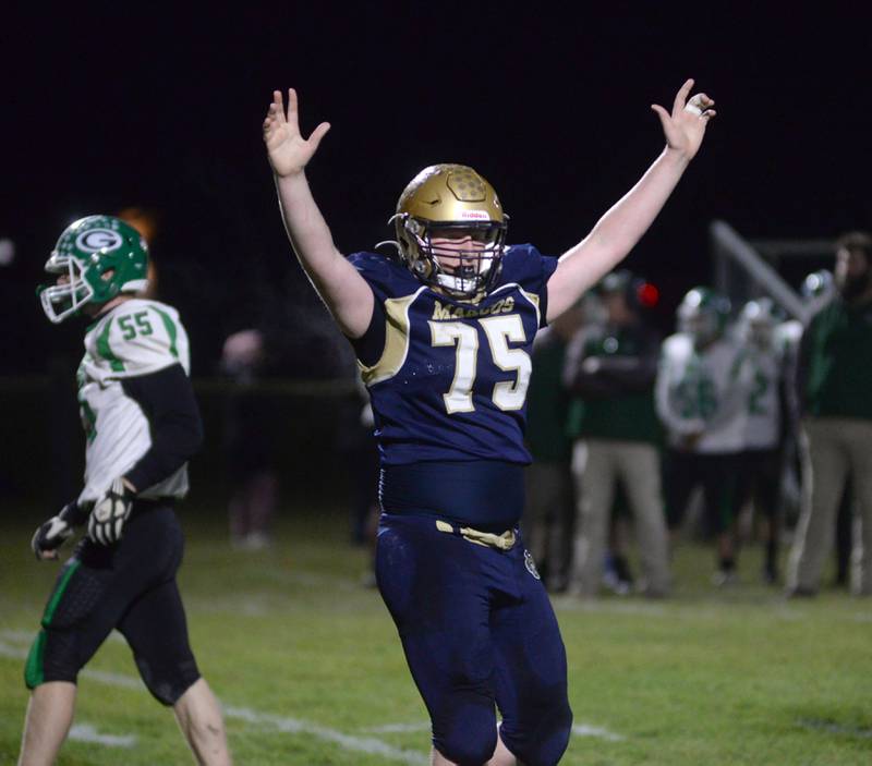 Polo's Wyatt Plachno (75) celebrates a Marco touchdown against Alden-Hebron during 8-man playoff action on Friday, Nov. 1, 2024 in Polo.