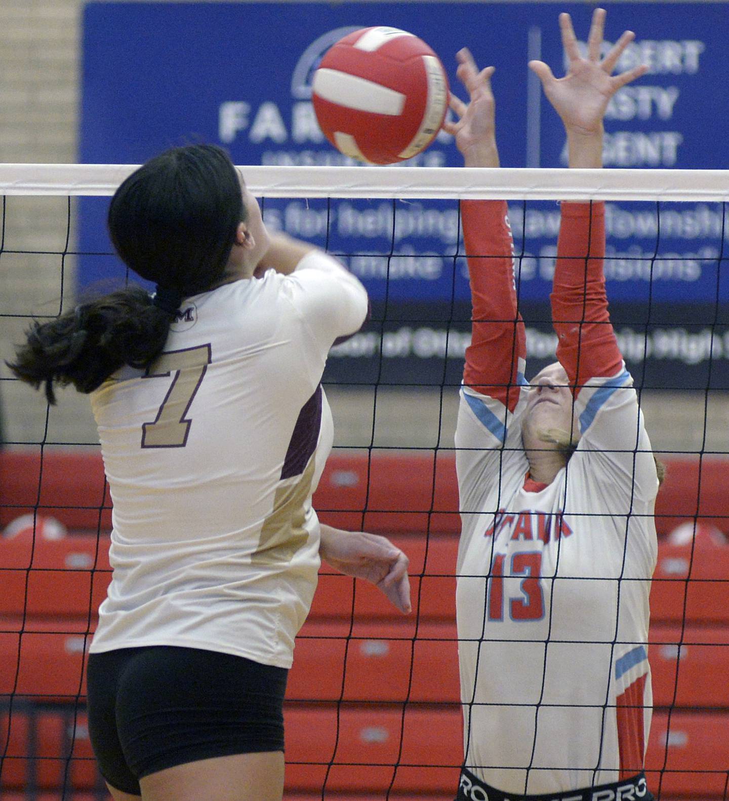 Morris’s Rosemary Misener gets the ball past Ottawa’s Ayla Dorsey during the 1st set Tuesday at Ottawa.