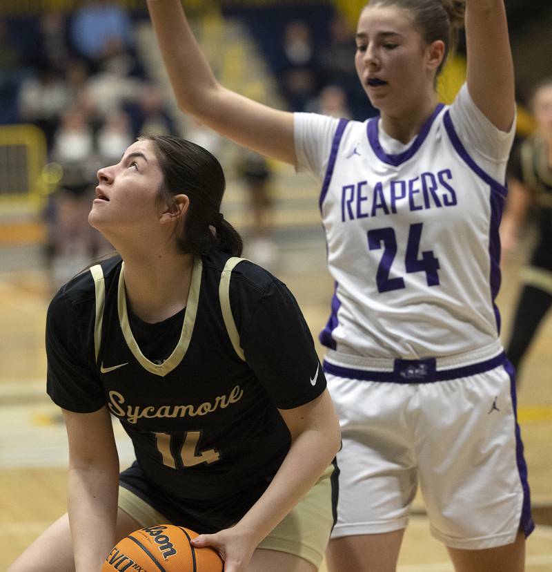Sycamore’s Norah Chami works below the basket against Plano Monday, Feb. 17, 2025, during a 3A semifinal in Sterling.