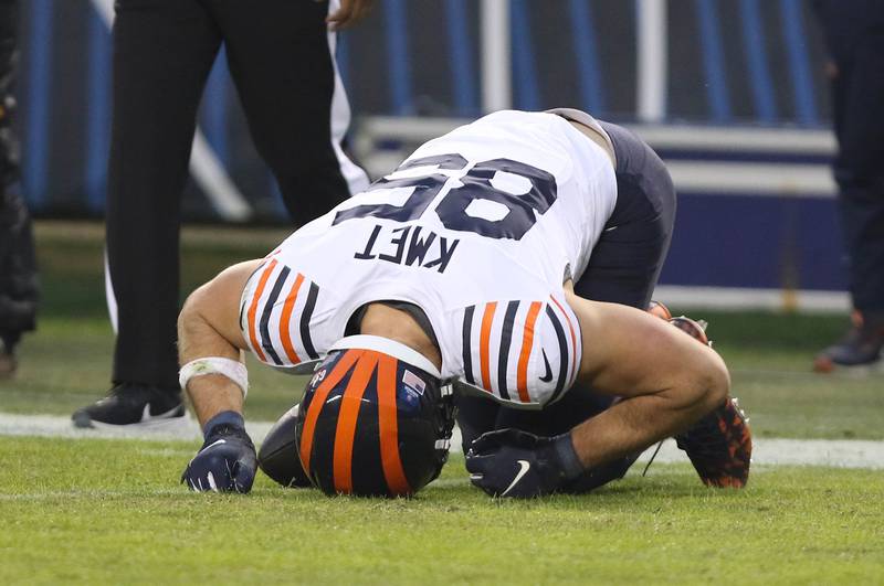 Chicago Bears tight end Cole Kmet is injured after making a catch late in the first half of their game against the Arizona Cardinals Sunday, Dec. 24, 2023, at Soldier Field in Chicago.