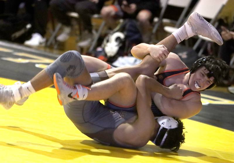 Jacobs’ Connor Zacarias, bottom, battles Crystal Lake Central’s Dominic Vitale at 157 pounds in varsity wrestling on Thursday, Jan. 16, 2025, at Jacobs High School in Algonquin.