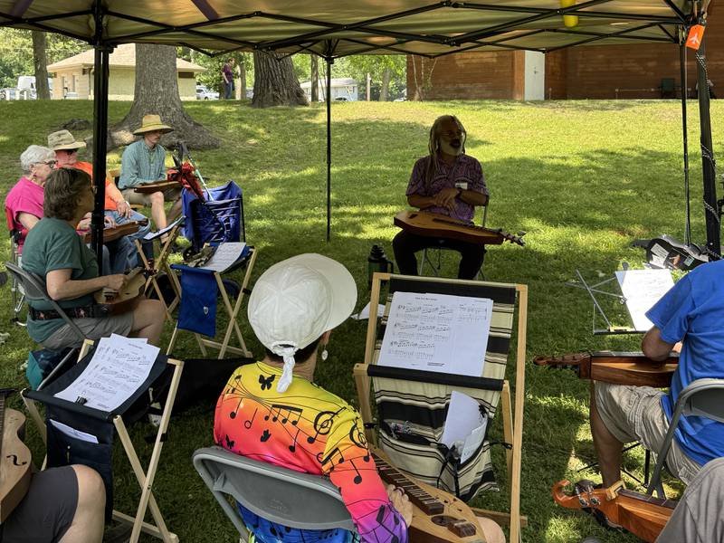 Bing Futch teaches a workshop on the art of flat picking on a dulcimer at the HANDS of Illinois Hammer and Dulcimer Festival on Saturday, June 14, 2025.
