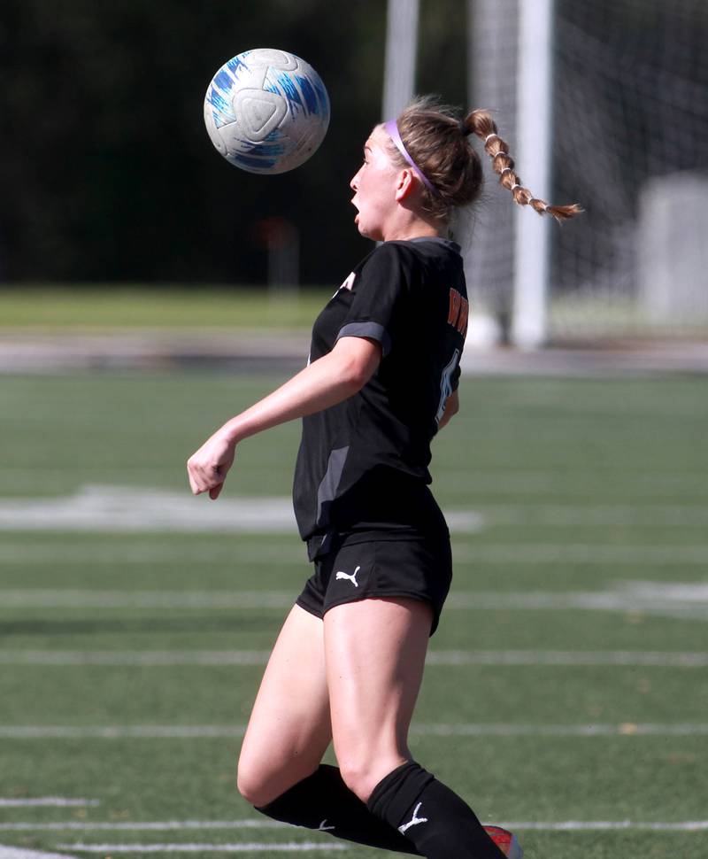 Wheaton Warrenville South's Ashley Alman gets control of the ball during a game against St. Charles East on Friday, May 16, 2025 in Wheaton.