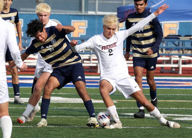 Lemont's Aidan Ontiveros and Prairie Ridge's Logan Braun try to get possession of the ball Saturday, Nov. 9, 2024, during their Class 2A state third place game at Hoffman Estates High School.