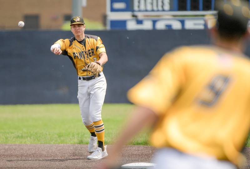 Putnam County's Andrew Pyszka (2) makes the throw to fist for the out against Marquette during the Baseball 1A Harvest Christian Sectional at Judson College in Elgin on Saturday, May 28, 2022.