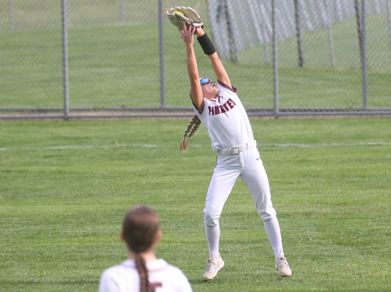 Ottawa's Rylee Harsted reaches up to make a catch against Seneca on Friday, May 2, 2025 at Ottawa High School.