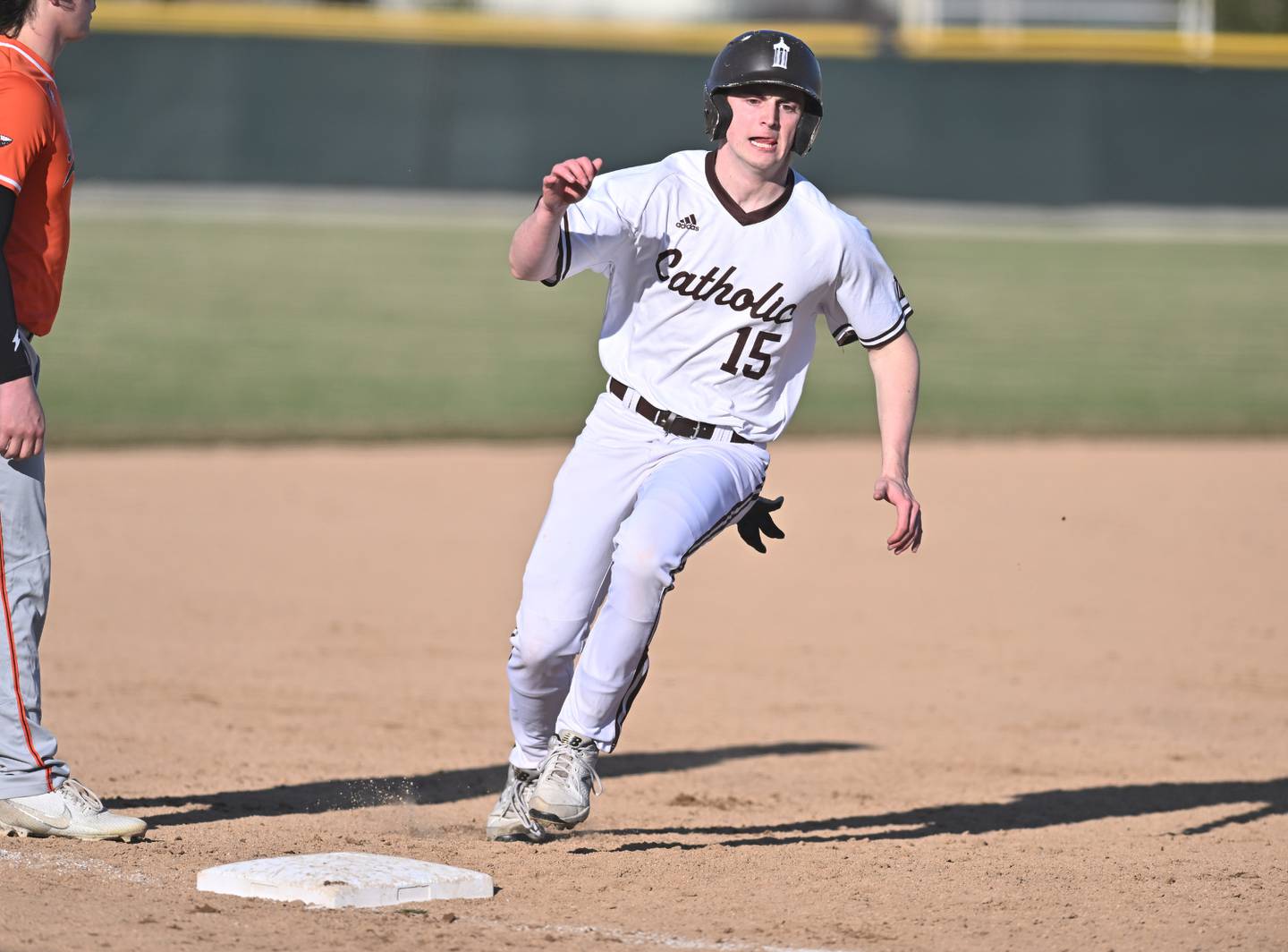 Joliet Catholic's Jack Ryan running to third base during the non-conference game against Minooka on Monday, March. 11, 2024, at Joliet.