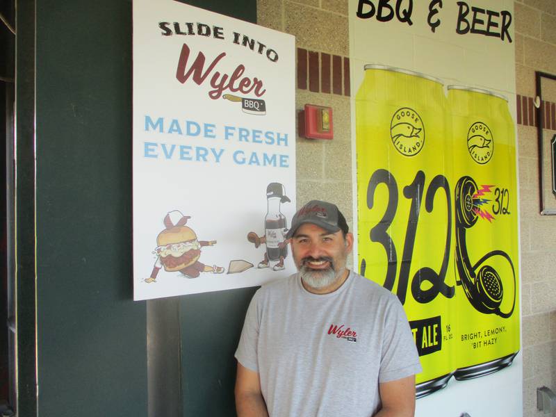 Tom Wyler stands by the concession at Duly Health and Care Field in Joliet that he said was his first brick-and-mortar location when he opened it last year. May 3, 2024.