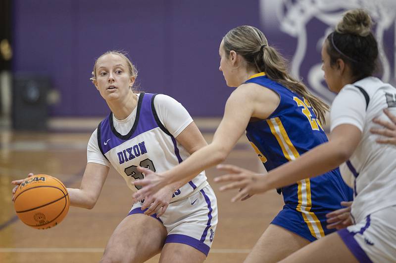 Dixon's Makenzie Toms makes a pass against Aurora Central Thursday, Dec. 26, 2024, during the Dixon Girl’s KSB Holiday Basketball Classic.