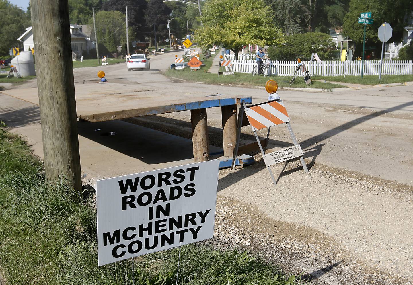 Traffic navigates roads construction along Dean Street in Woodstock Tuesday, Aug. 23, 2022. A lot of road construction programs in McHenry County cities are wrapping up, but some road projects, though will see work into the fall.