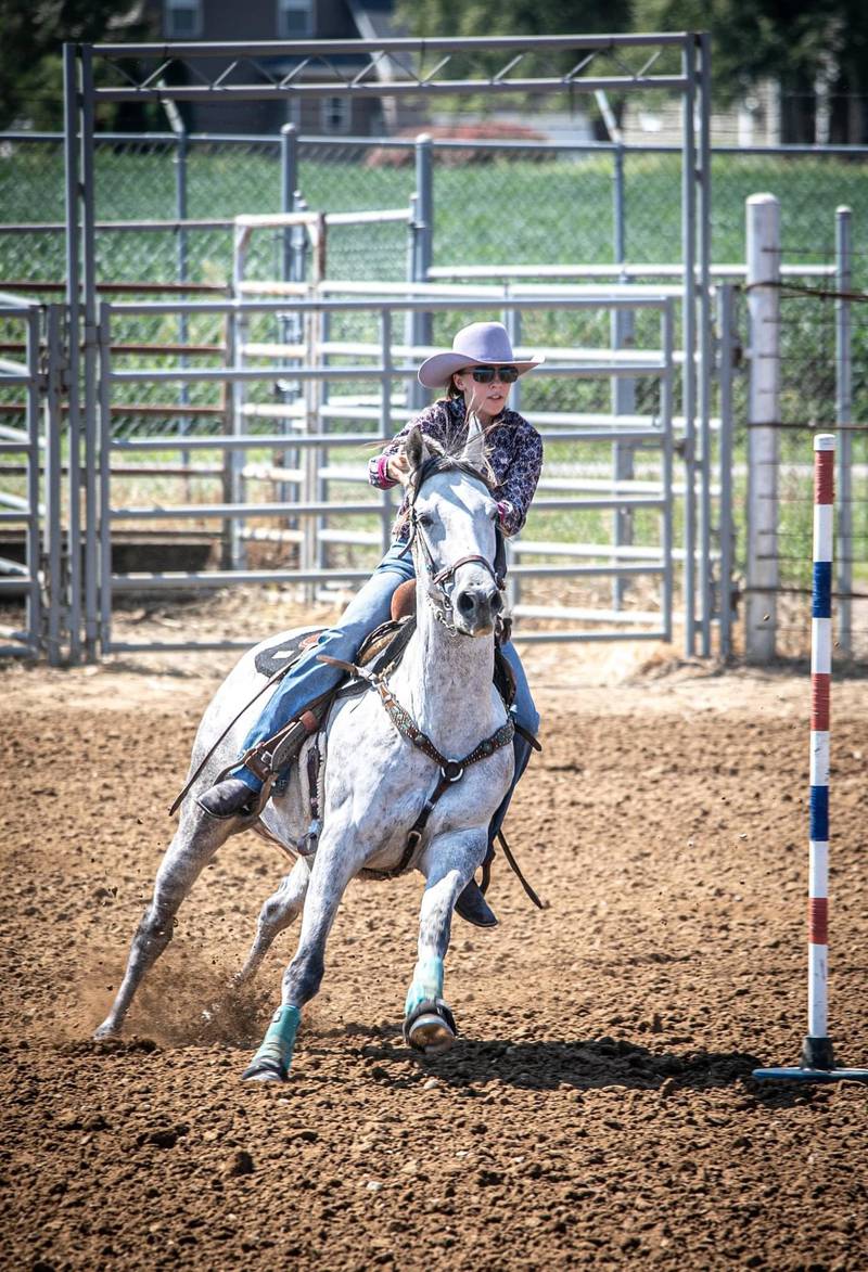 Quincy Hochstatter, a sophomore from Bureau Valley High School, rides in the Illinois High School Rodeo Association rodeo in Montincello on Aug. 24-25.