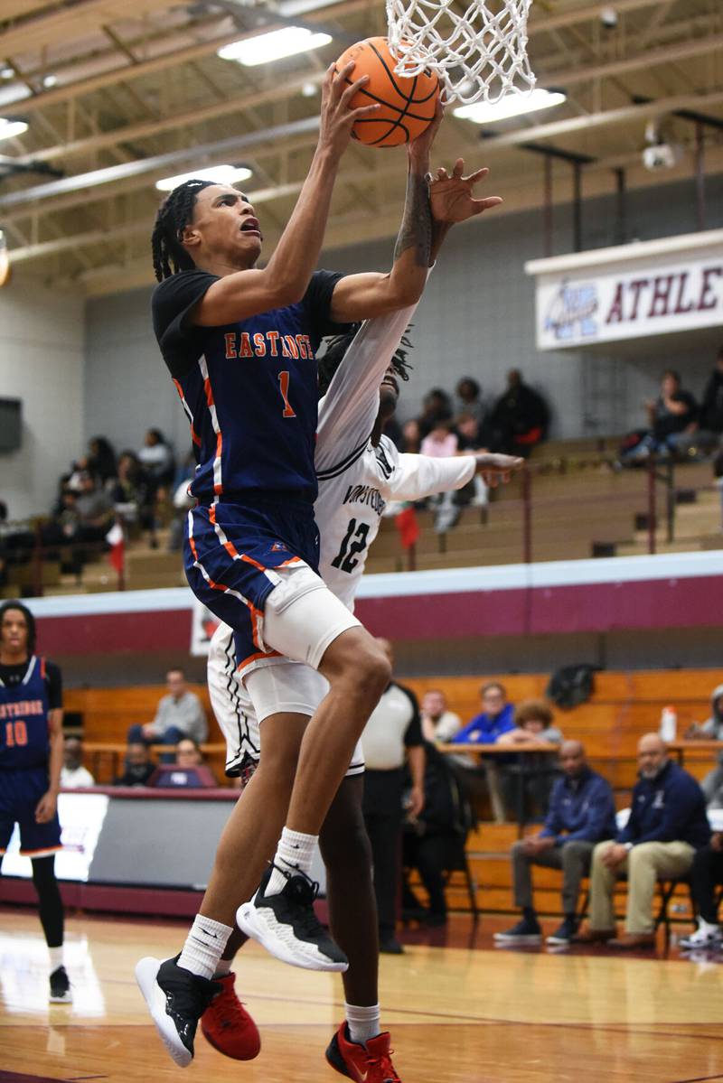 Kankakee’s Lincoln Williams, left, elevates at the basket as he’s fouled by Von Steuben’s Anthony Smith during Thursday’s maroon bracket game at the Kankakee Holiday Tournament. Williams had a game-high 32 points in the Kays’ 103-41 win.