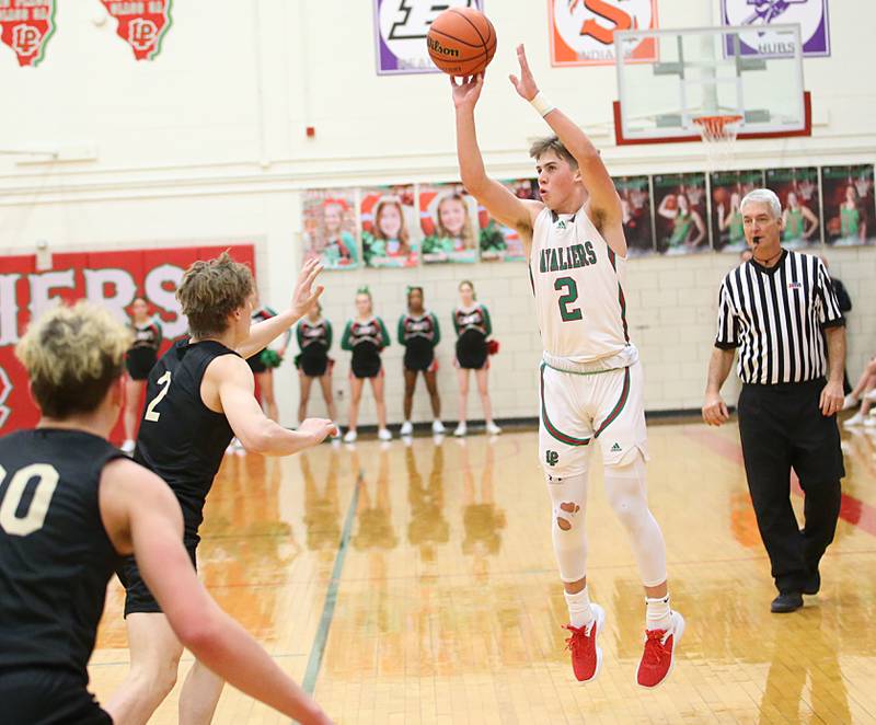 L-P's Seth Adams shoots a three point basket over Sycamore's Aidan Wyzard on Tuesday, Jan. 31, 2023 at L-P High School.