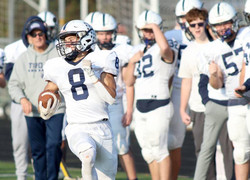 Cary-Grove’s Andrew Prio runs the ball against Highland Park in second-round IHSA Class 6A playoff action at Wolters Field in Highland Park Saturday.