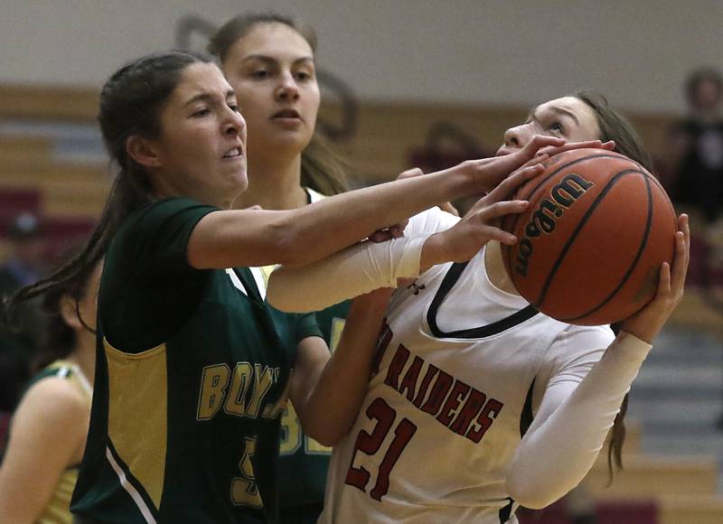 Huntley's Samantha Campanelli, right, is fouled by Boylan's Maggie Schmidt as Campanelli, drives to the basket during a Dundee-Crown Thanksgiving Girls Basketball Tournament basketball game Wednesday, Nov.. 16, 2022, between Huntley and Boylan at Huntley High School.