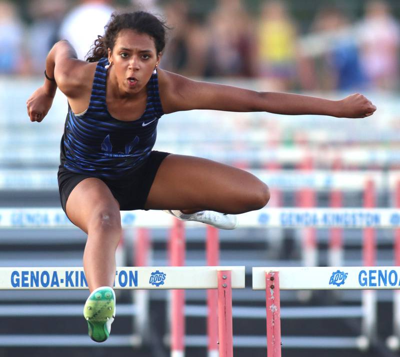 Woodstock’s Amina Idris wins the 100-meter hurdles in IHSA Class 2A Girls Sectional Track action at Genoa-Kingston School in Genoa on Friday, May 16, 2025.