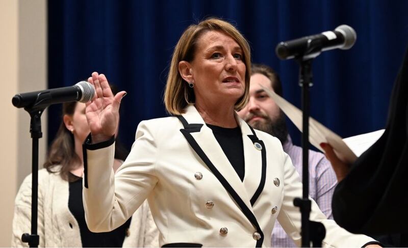 New DuPage County Board Chair Deb Conroy is sworn in Monday night in Wheaton. (Karie Angell Luc for the Daily Herald)