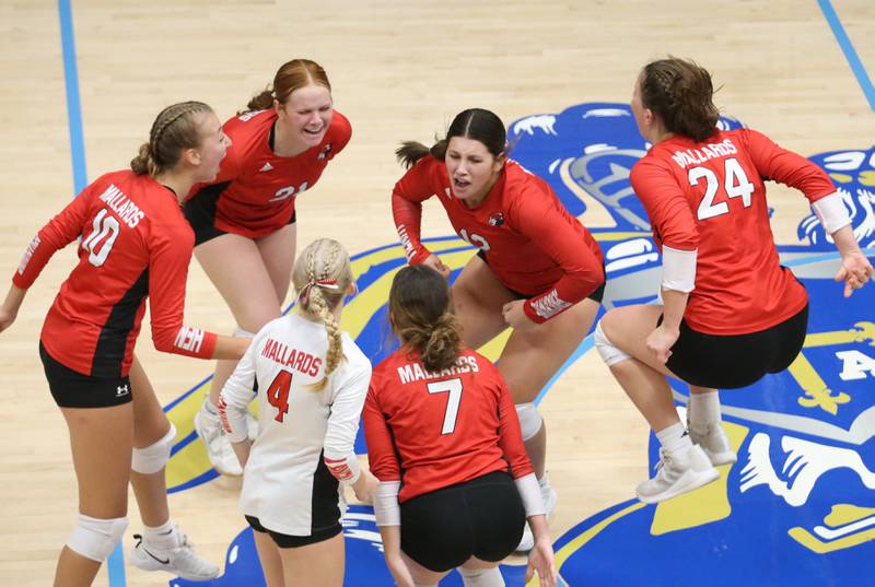 Members of the Henry-Senachwine volleyball team react after winning the Tri-County Championship over Seneca on Thursday, Oct. 17, 2024 in Bader Gym at Marquette High School.