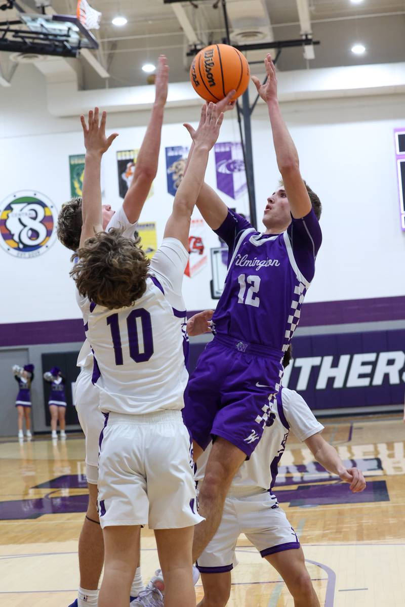 Wilmington's Brysen Meents shoots under pressure from Manteno defenders during Wilmington's 60-35 victory over Manteno on Tuesday, Feb. 17, 2026.