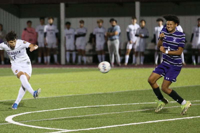 Mendota's Isaac Diaz kicks the ball by Peoria Christian's Trae Brickner during the Class 1A Sectional game on Wednesday, Oct. 30, 2024 at Chillicothe High School.