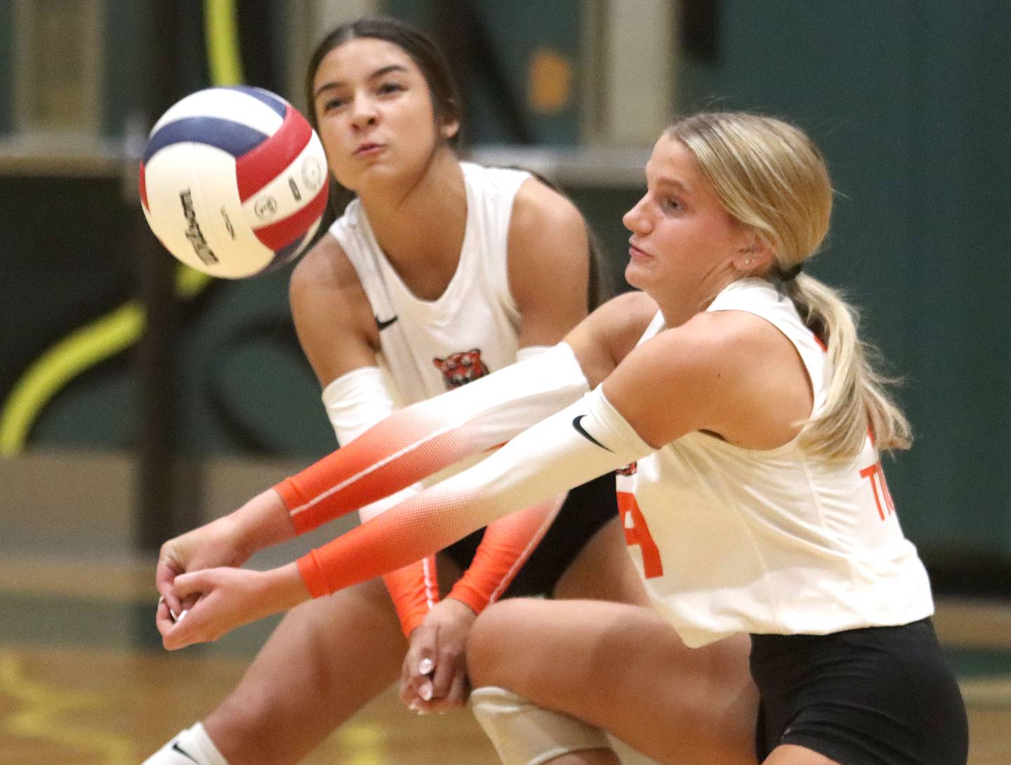 Crystal Lake Central’s Reilly McArdle, left, and Alexis Hadeler go for the ball  in varsity volleyball at Crystal Lake South High School in Crystal Lake on Tuesday, Oct. 7, 2025.