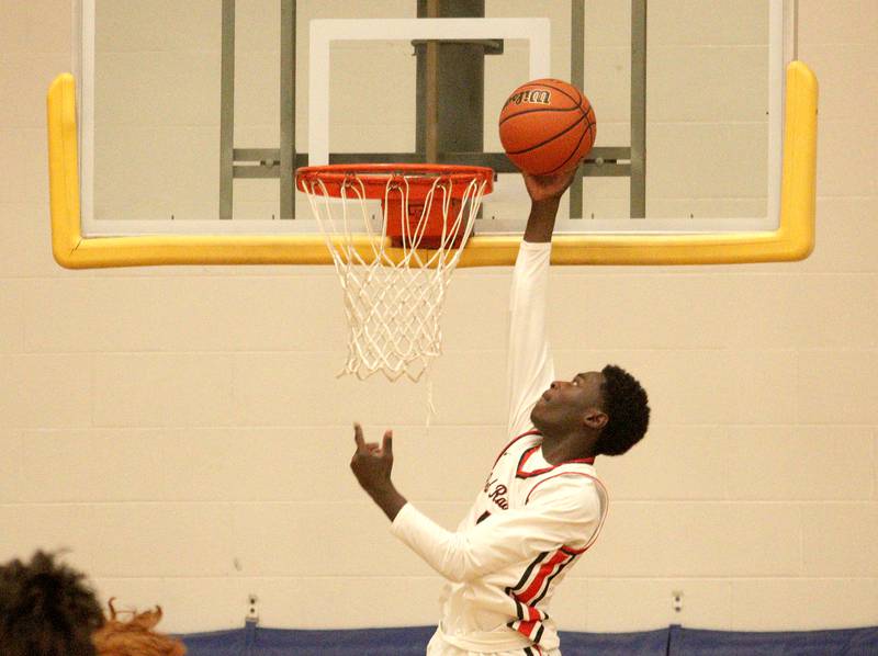 Huntley’s Jeffrey Cruickshank goes to the hoop against Crystal Lake Central during tournament basketball action at Johnsburg High School Monday evening.