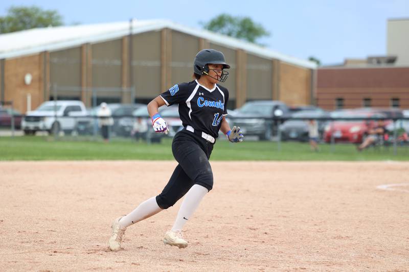Clifton Central's Rayven Perkins rounds third base to score during Clifton Central's 9-3 victory over St. Anne in the Class 1A Dwight Regional quarterfinal game at Central High School.