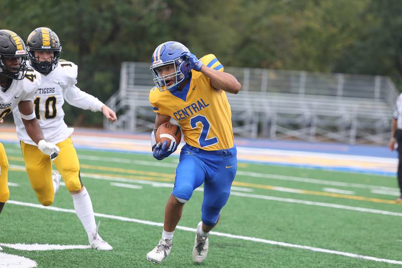 Joliet Central’s Christian Smith rushes to the outside against Joliet West on Saturday, Sept. 28, 2024 in Joliet.