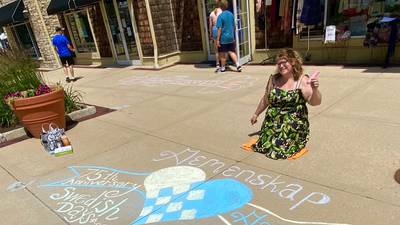 Geneva businesses create Swedish Days chalk art 
