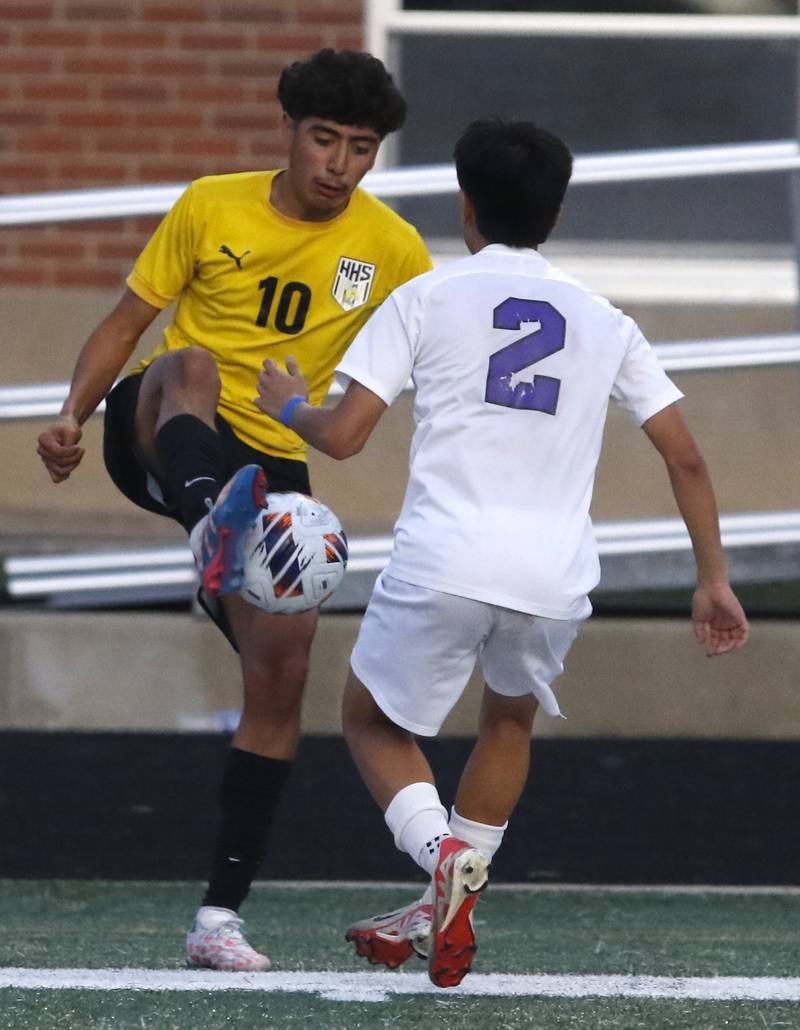 Harvard's Miguel Mercado controls the ball in front of Wauconda's Irwin Tellez during the IHSA Boys Soccer 2A Grayslake Central Sectional semifinal match on Tuesday, Oct. 29, 2024, at Grayslake Central High School,