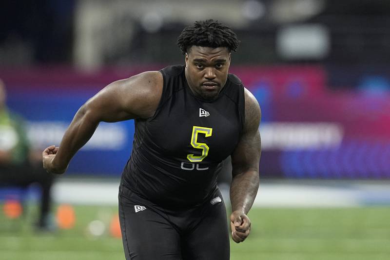 Southern A&M offensive lineman Ja'Tyre Carter runs a drill during the NFL Scouting Combine on March 4, 2022, in Indianapolis.