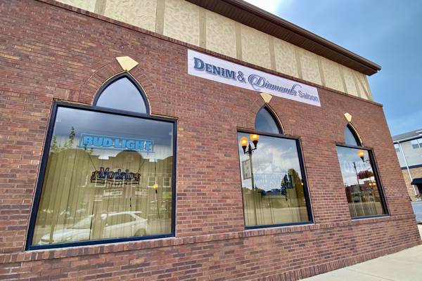 Building housing Denim & Diamonds Saloon up for sale, bar to stay open
