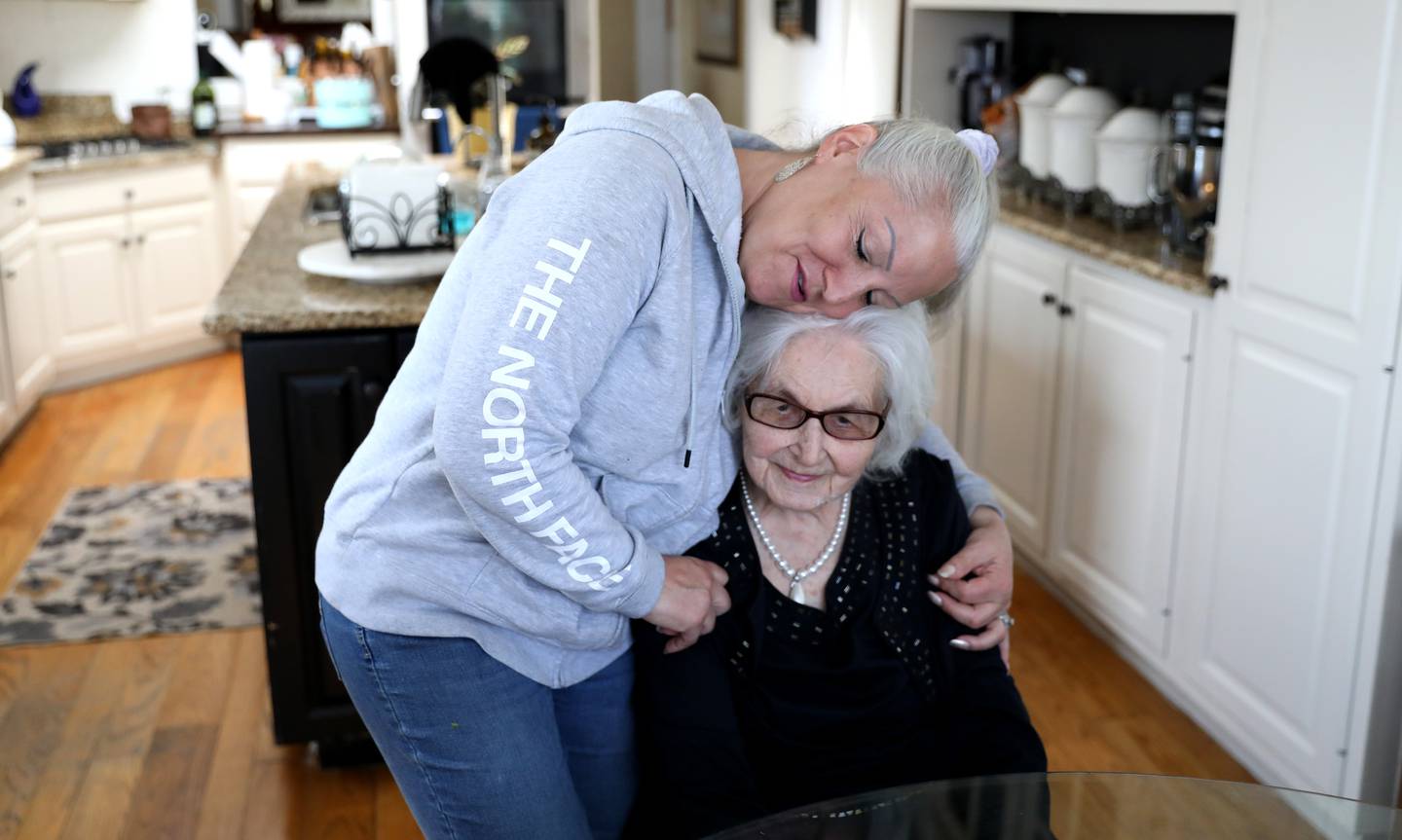 Anna Pacyna of Wayne, who will be 105 March 15, gets a hug from her niece, Dawn Trujillo. Pacyna was born in Chicago but spent her childhood in Poland before moving back to Chicago in 1935.
