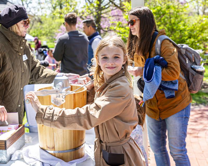 Lucy Raye helps make ice cream at the Downers Grove Park District Country in the Park on Saturday, May 3, 2025  in Downers Grove.