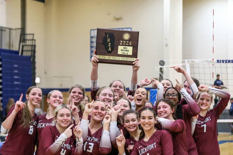 Lockport celebrates their victory over Downers Grove South in their Class 4A Riverside-Brookfield Supersectional match.  Nov 11, 2024  in Riverside.