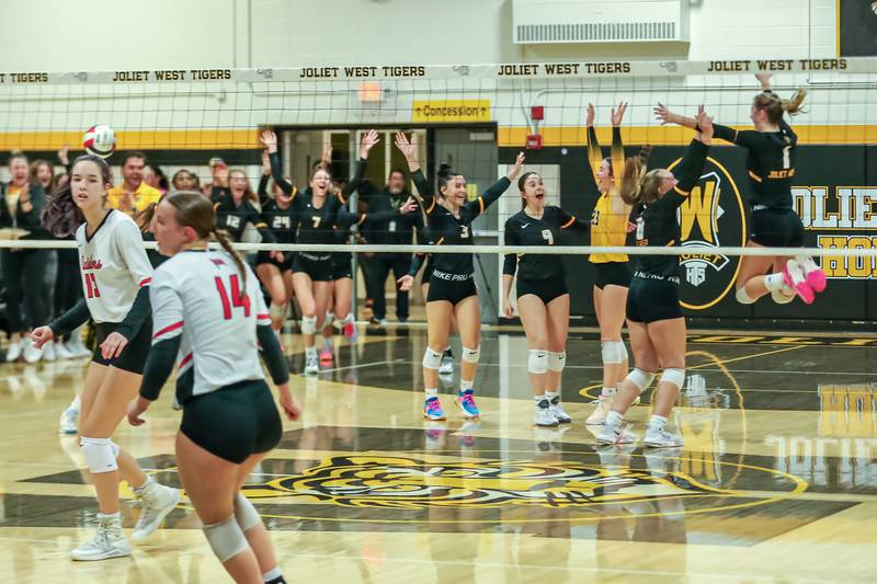 Joliet West celebrates winning the regional final over Bolingbrook.  Oct 26, 2023.