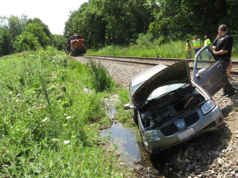 Train and police officials investigate the scene of a train and vehicle crash on Thursday, Aug. 8 off of Van Emmon Road near the Hideaway Lakes campground in Bristol Township.
