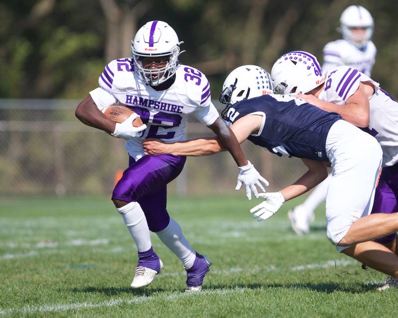 Hampshire's Tymere Marshall runs the ball against Cary Grove on Saturday Oct. 5,2024 in Cary.