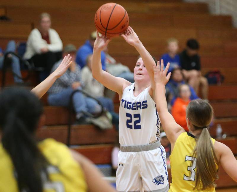 Princeton's Camryn Driscoll shoots a jump shot over Putnam County's Gabby Doyle during the Princeton High School Lady Tigers Holiday Tournament on Thursday, Nov. 16, 2023 at Prouty Gym.