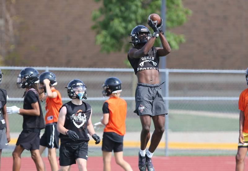 Dekalb’s Jauharie Wilson works on a tip drill during practice Monday, Aug. 7, 2023, at DeKalb High School.