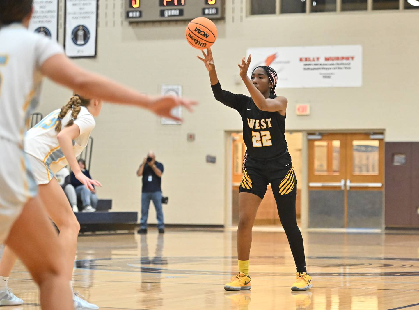 Joliet West's guard Makayla Chism (22) passes the ball during the WJOL basketball tournament against Joliet Catholic on Monday, Nov 18, 2024 at Joliet. (Dean Reid for Shaw Local News)