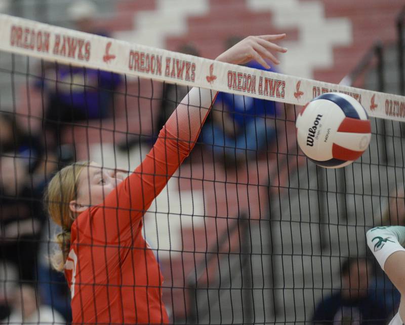 Oregon's Isabelle Berg tips the ball against West Carroll during the Oregon Varsity Girls Volleyball Tournament on Friday, Sept. 5, 2025 at the Blackhawk Center in Oregon.