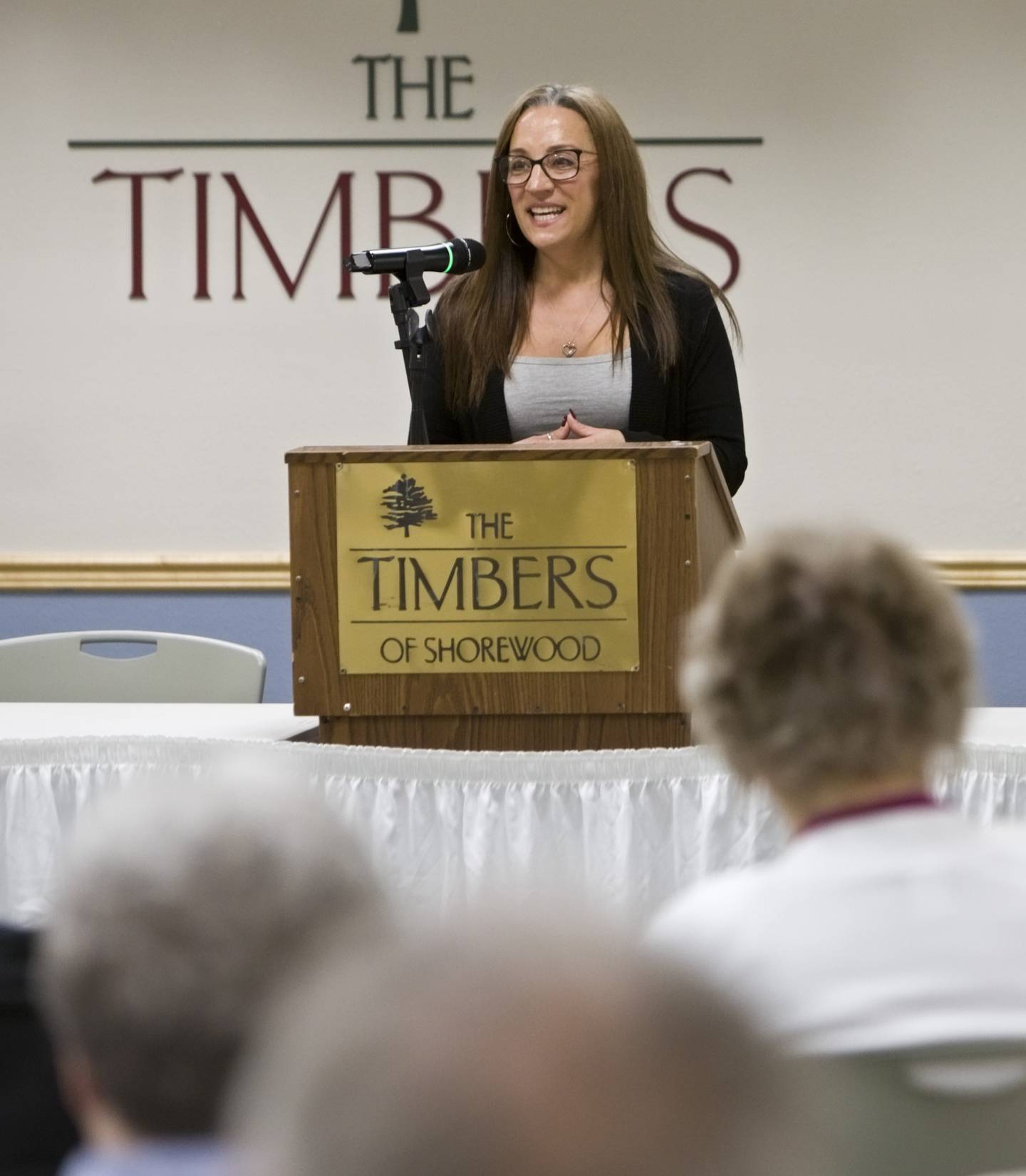 Angie Aegerter, of Channahon, speaks at Meet the Authors event after donating funds that were used to buy copies of WriteOn Joliet’s fifth anthology. Books were donated to the Timbers of Shorewood book club. Thursday, November 9, 2023 Shorewood Ill.