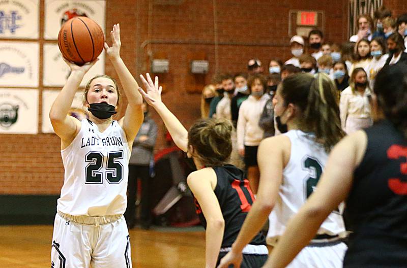 St. Bede's Ella Hermes, (25) shoots a shot over Hall's Brooke Spoonmore (11) during a game on Monday Nov. 29, 2021 at St. Bede.